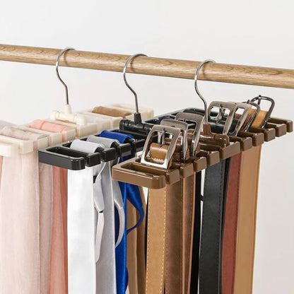 Multifunctional rotating tie and belt hanger