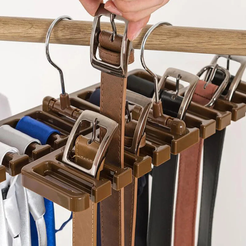 Multifunctional rotating tie and belt hanger