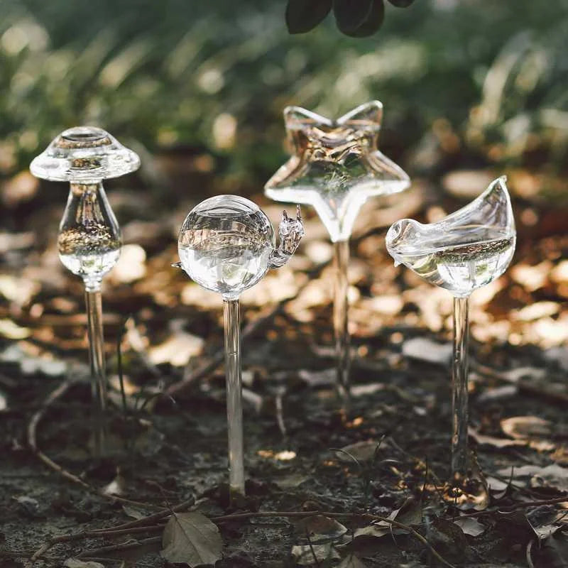 (2+2 Free) PlantCare™ - Beautiful glass self-watering bird feeders with bird, star and mushroom motifs! [Last day discount]