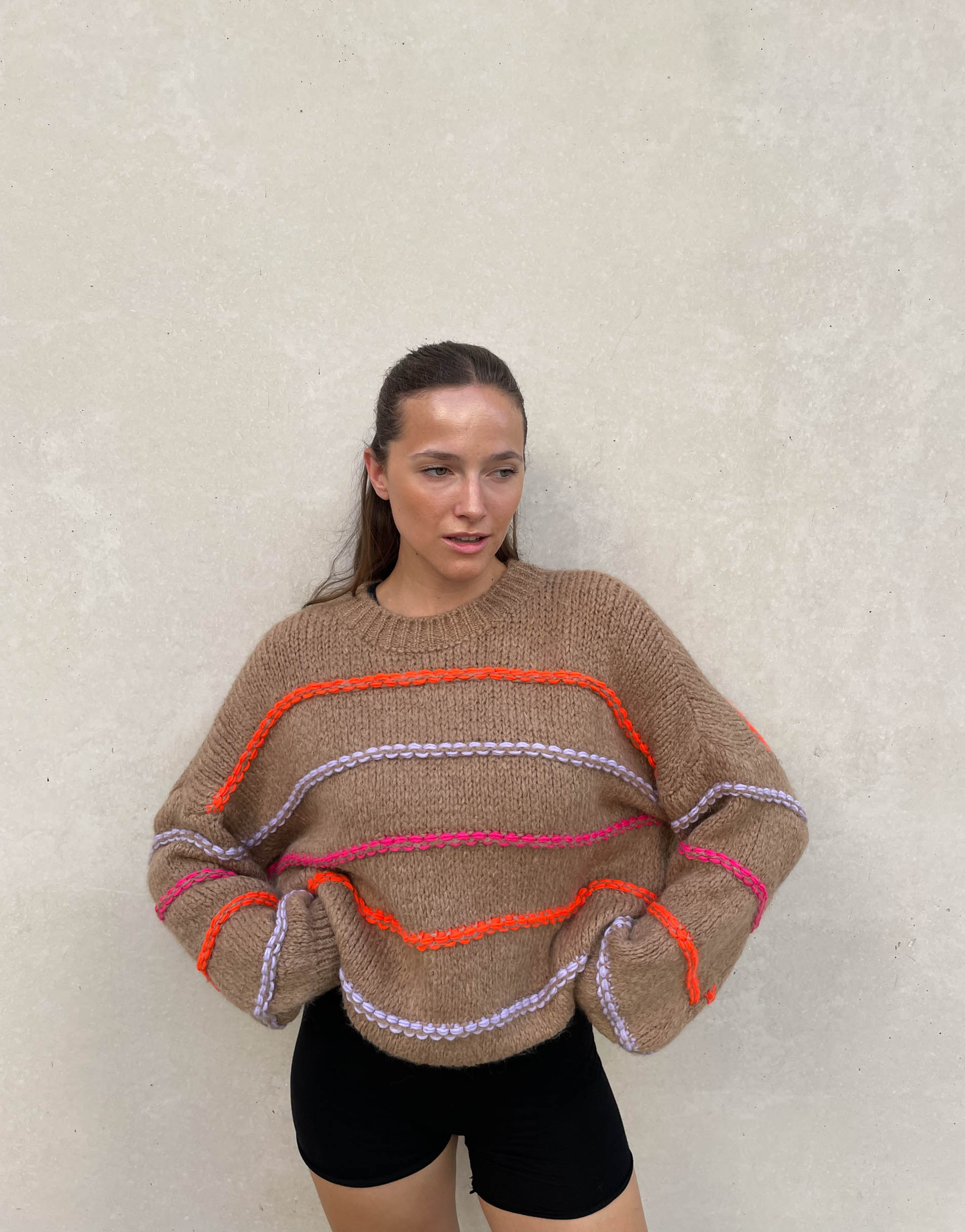 Oversized sweater with neon seam