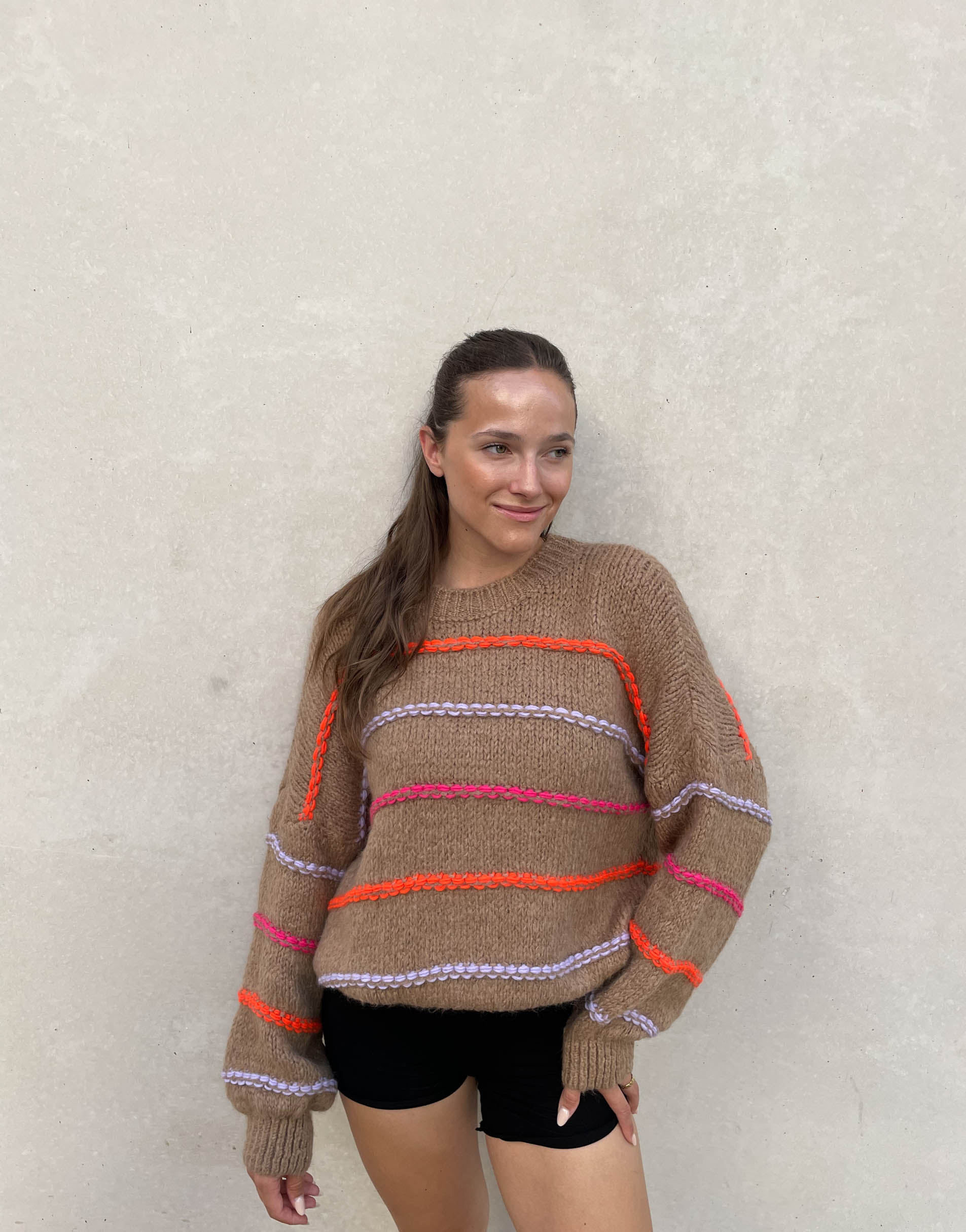 Oversized sweater with neon seam