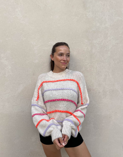 Oversize sweater with neon seam