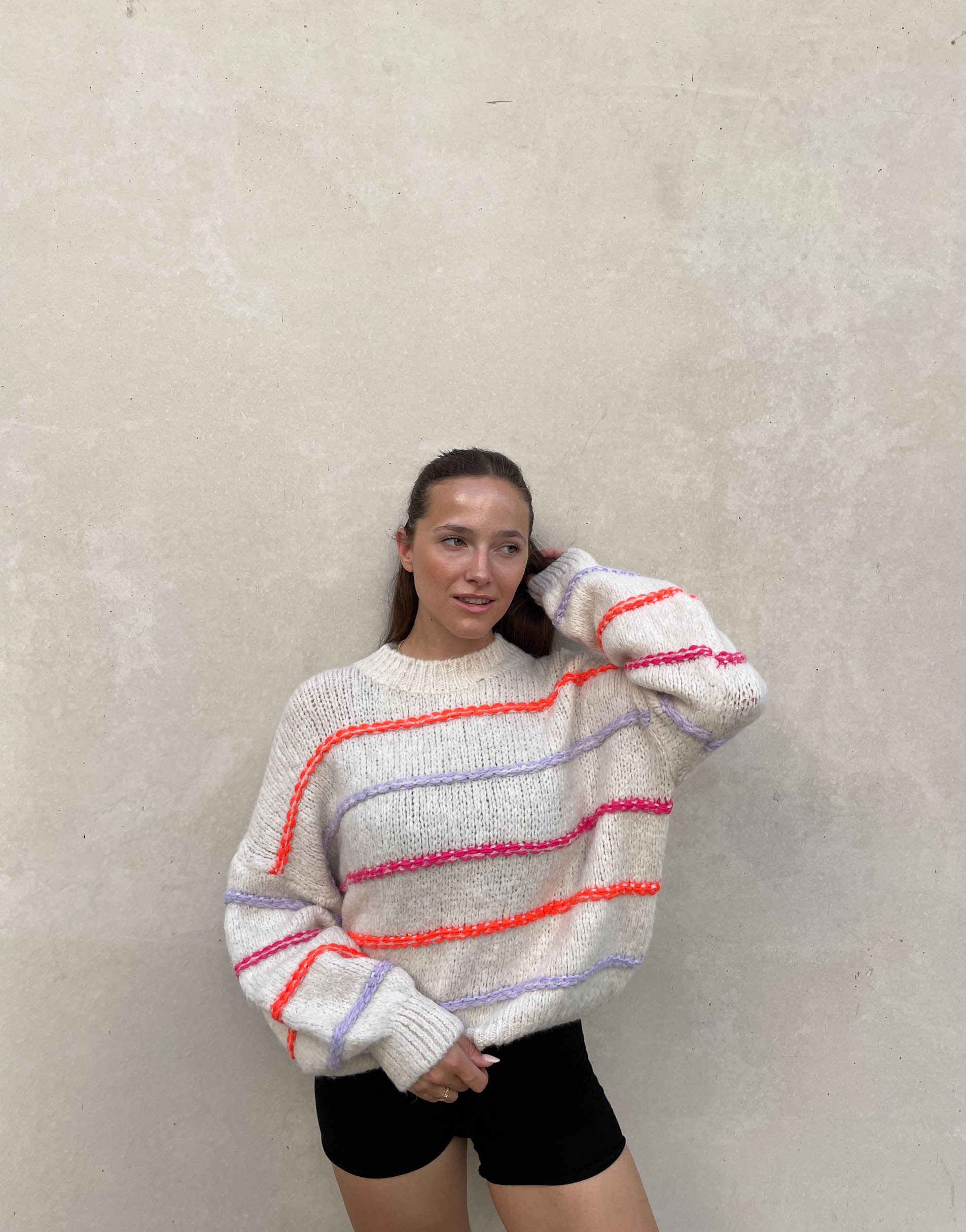 Oversized sweater with neon seam