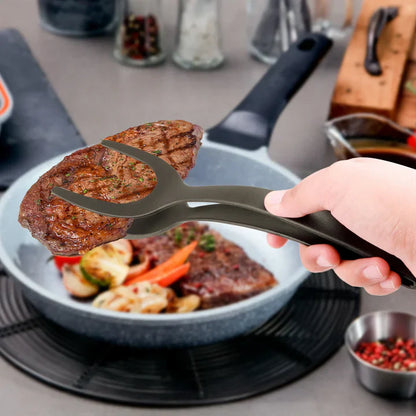 Multi -purpose spatula with ergonomic handle