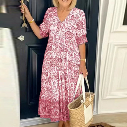 Summer dress with a V-neck and floral pressure