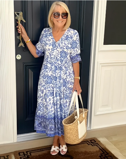 Summer dress with a V-neck and floral pressure