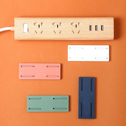 Self -adhesive socket strip holder