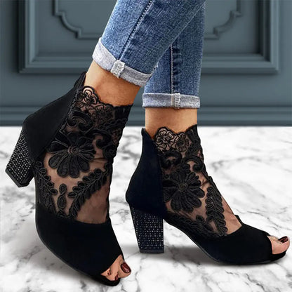 Black ankle boots with summer posts