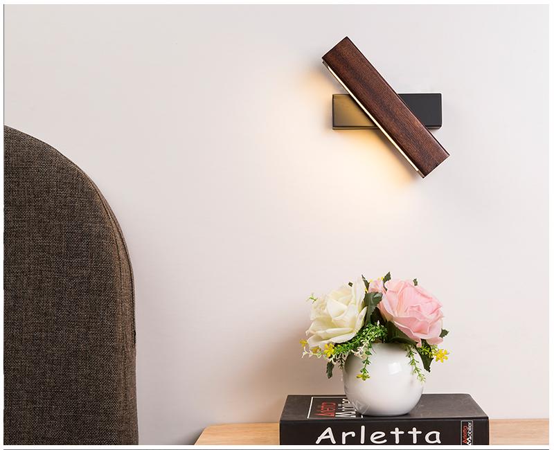 Rotatable LED wall lamp made of wood